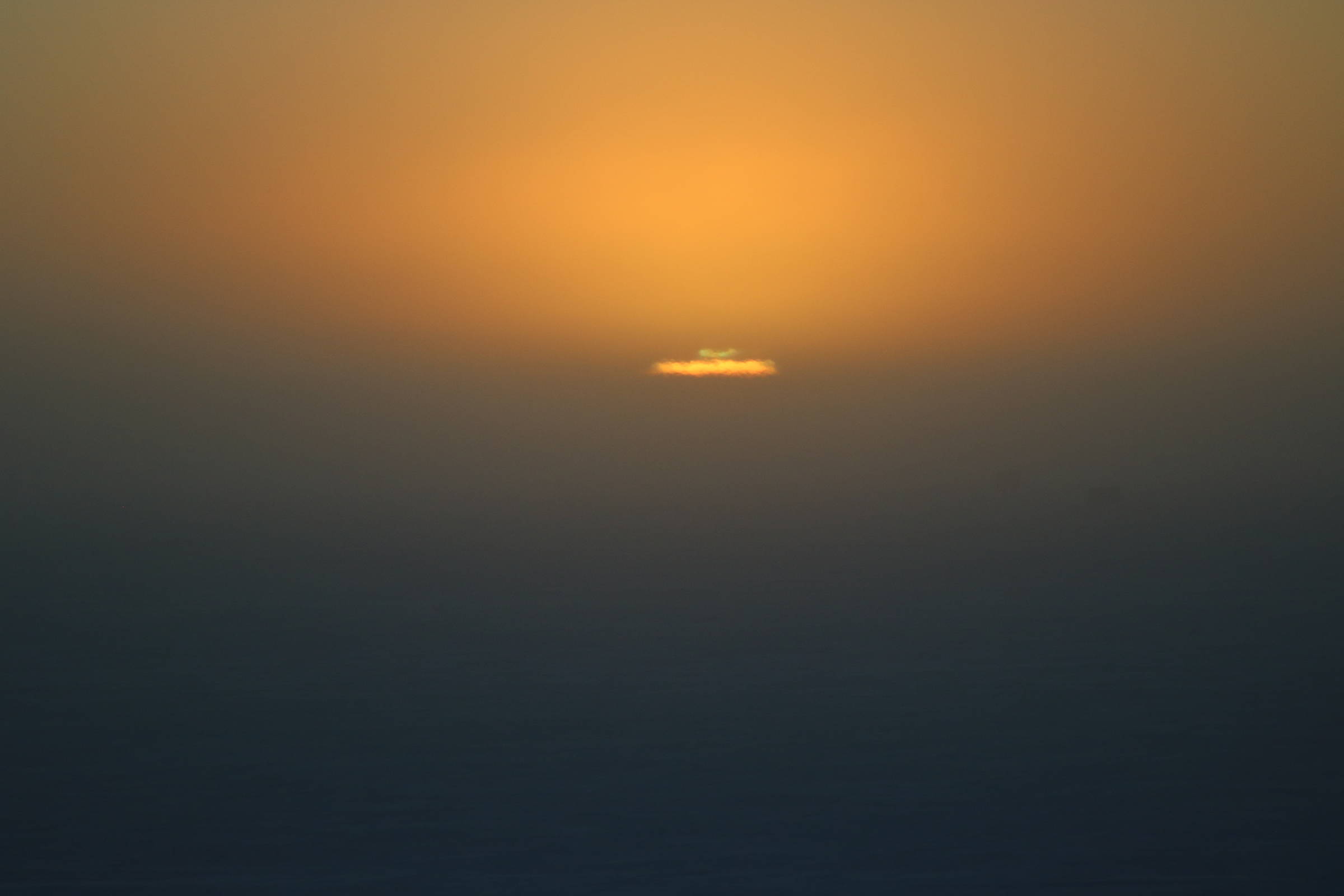 The green flash, an elusive light phenomena caused by the atmosphere, visible mostly in very flat surroundings. (Picture: G. Hall)